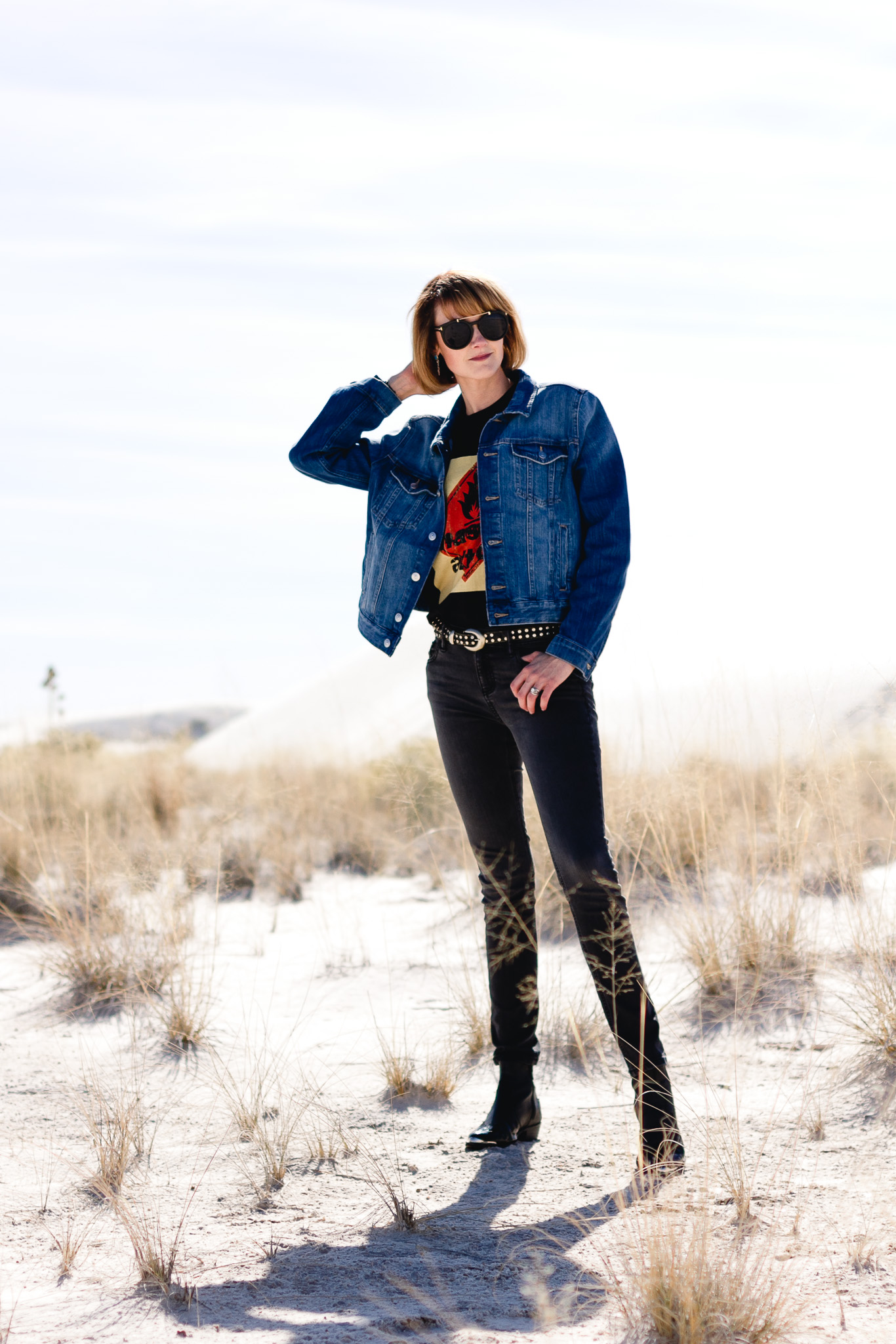 mesh top, black denim, and western boots