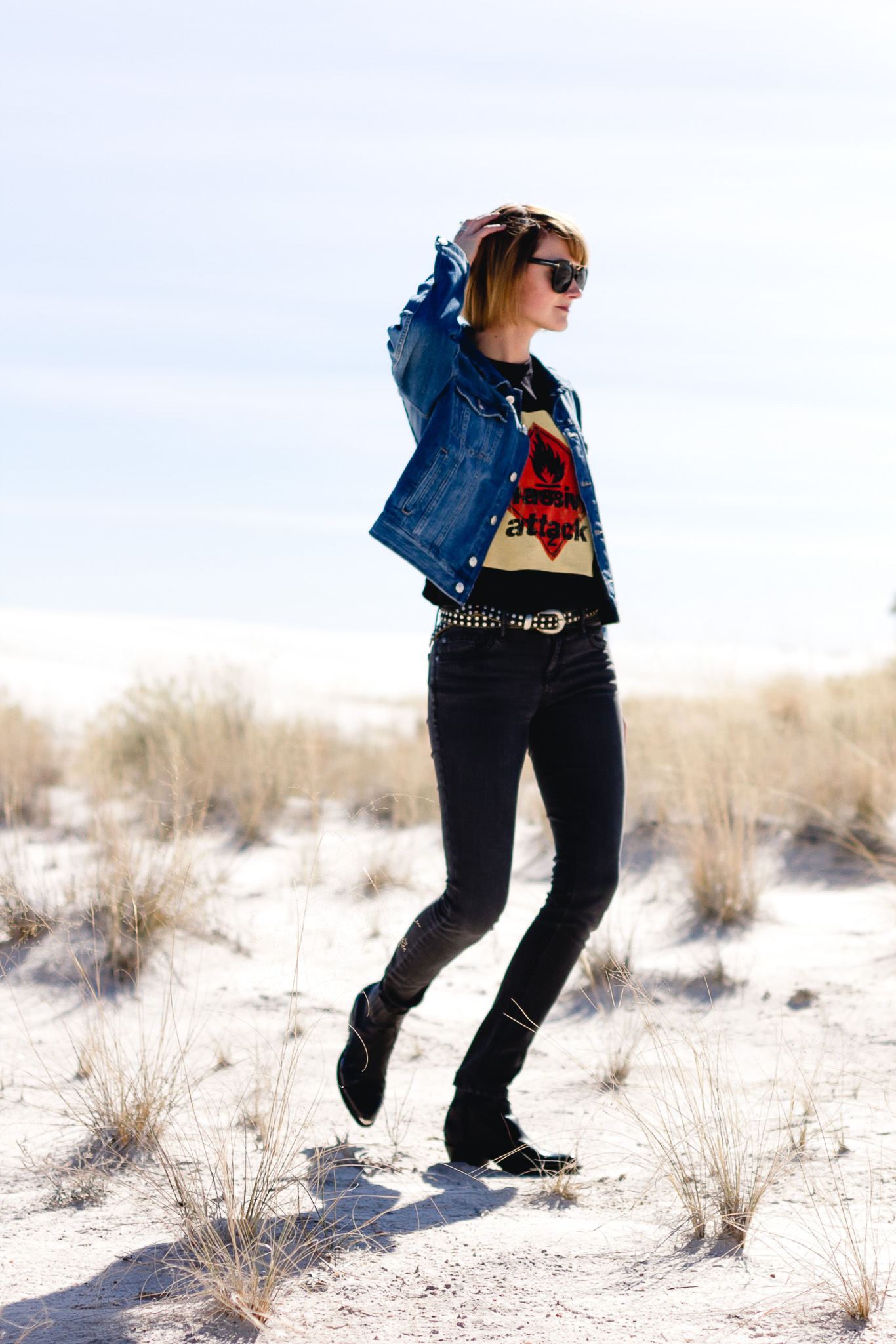 oversized denim jacket, black denim, and western boots