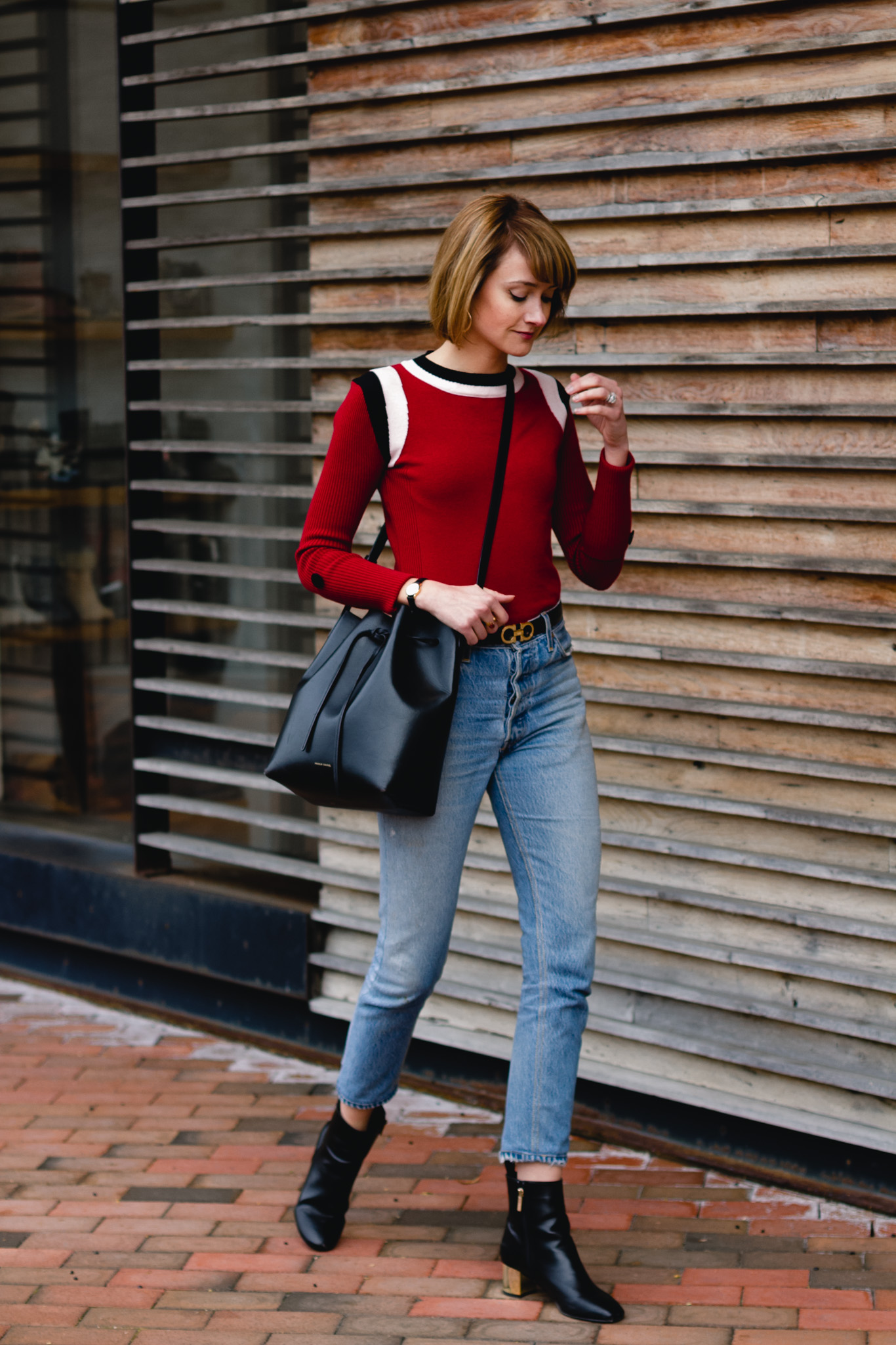 Marni sweater, RE/DONE jeans, and Mansur Gavriel bag
