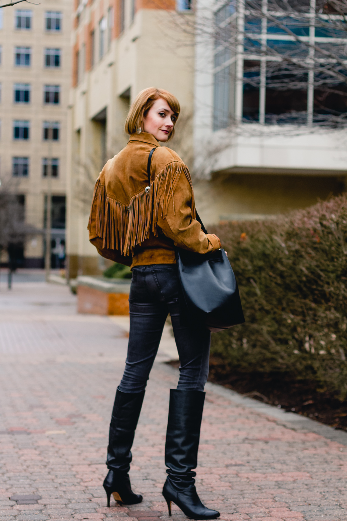 fringe leather jacket and slouchy boots
