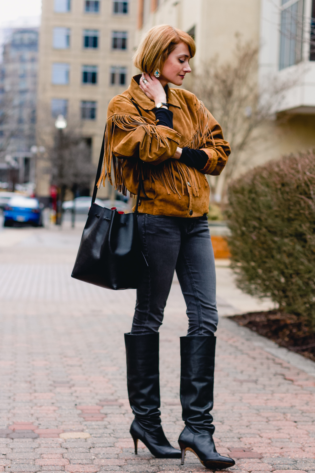fringe leather jacket and slouchy boots
