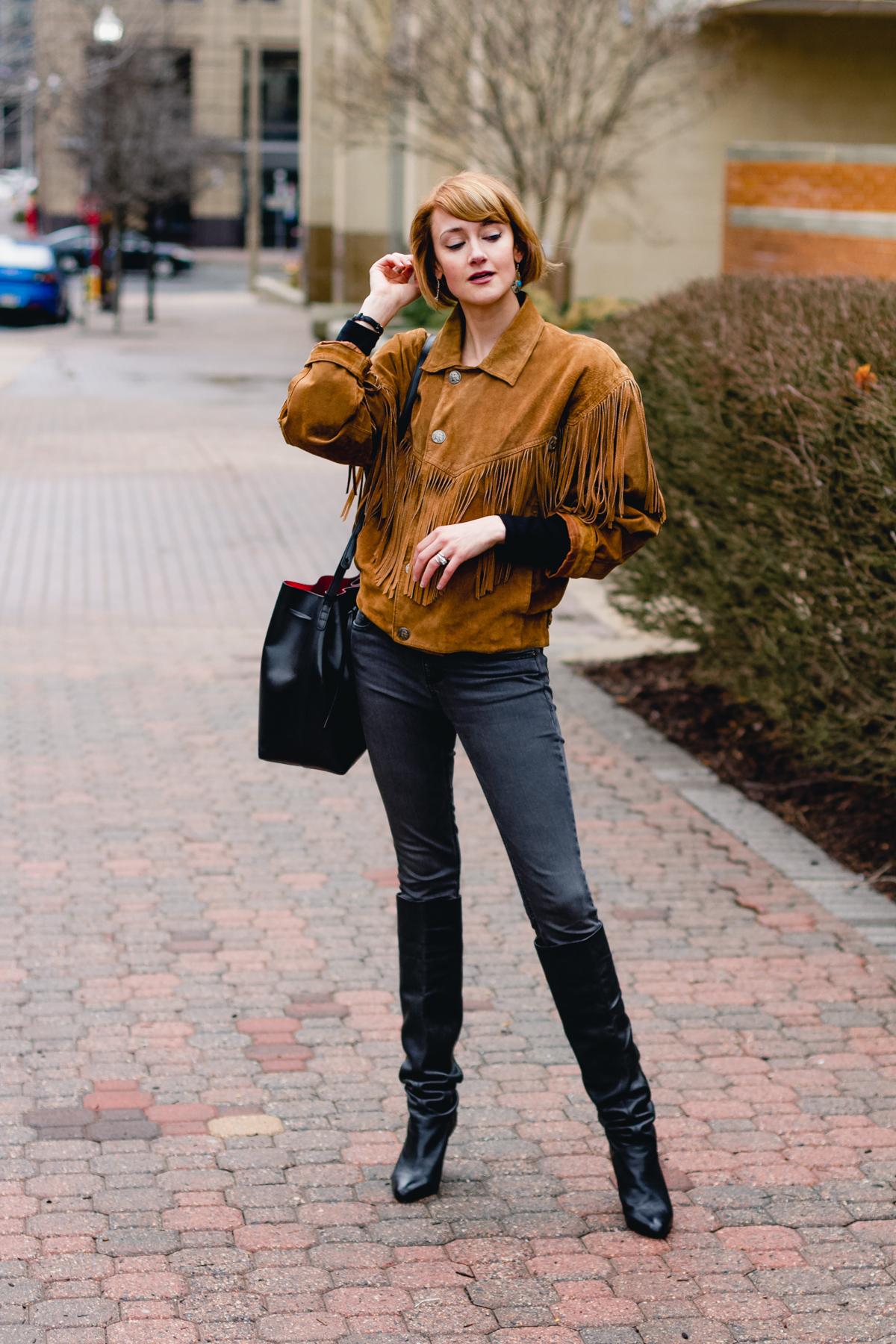 fringe leather jacket and slouchy boots