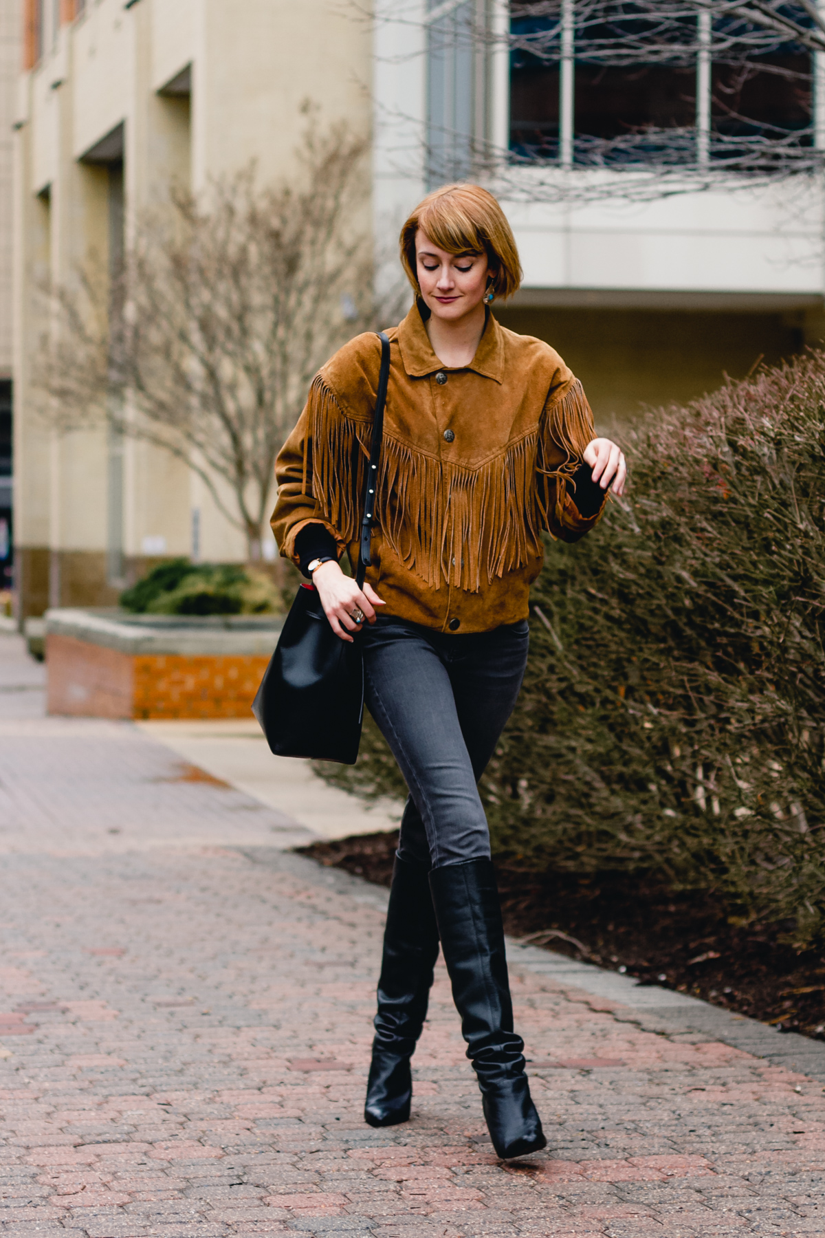 fringe leather jacket and slouchy boots