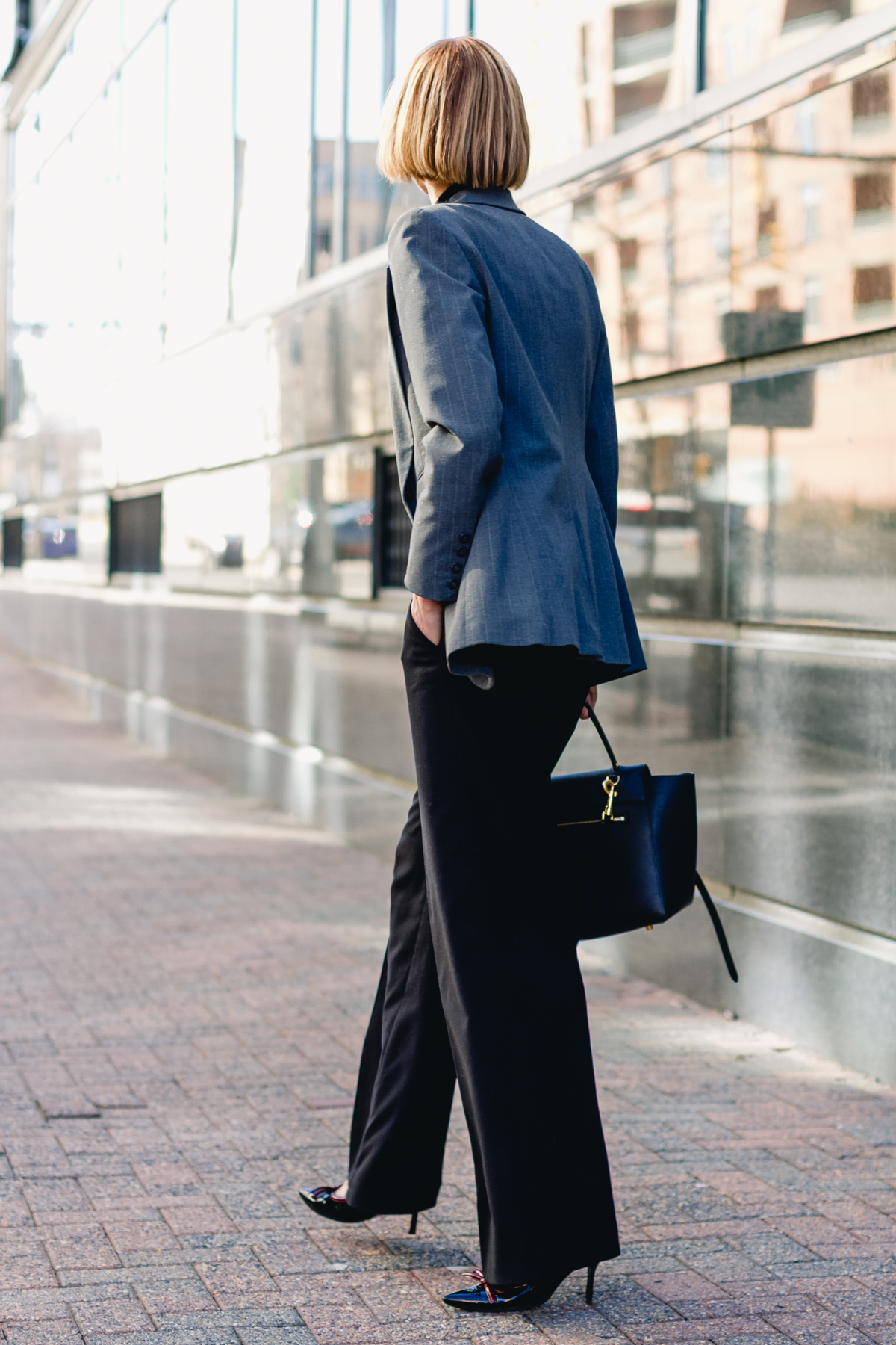 gray Express blazer, satin Equipment top, and wide-legged pants