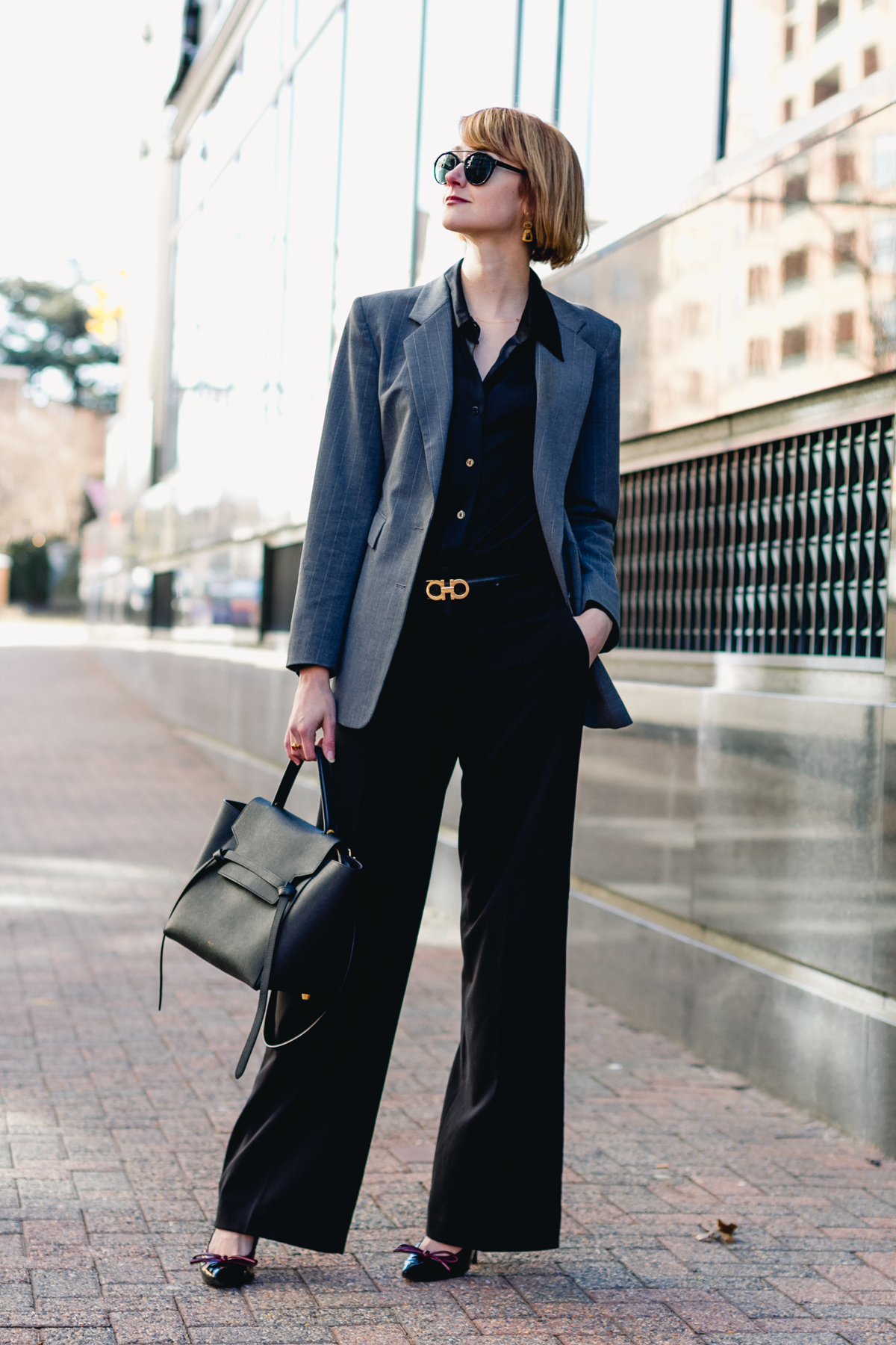 gray Express blazer, satin Equipment top, and wide-legged pants