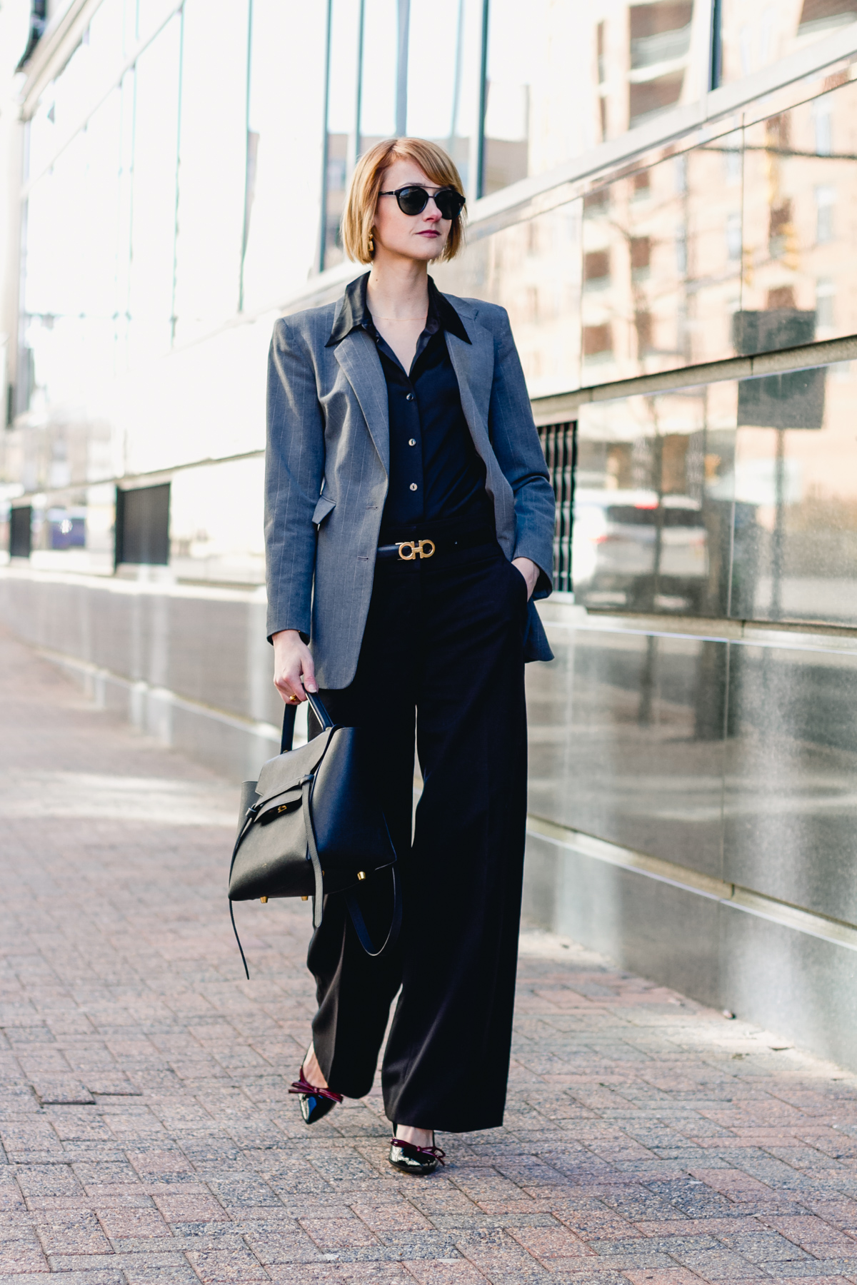 gray Express blazer, satin Equipment top, and wide-legged pants