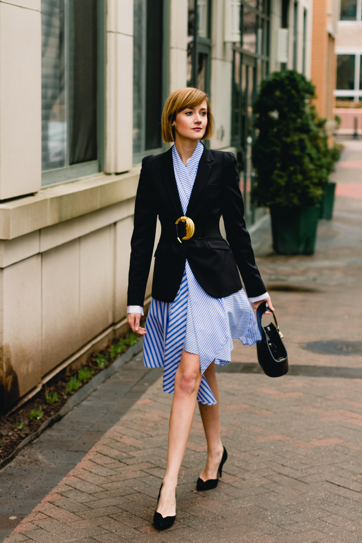 belted blazer and striped asymmetrical dress