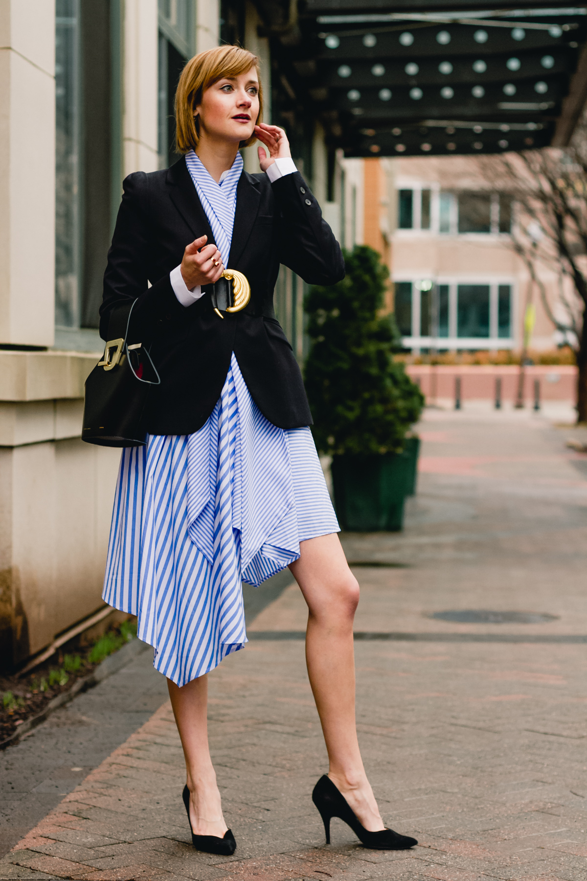 belted blazer and striped asymmetrical dress