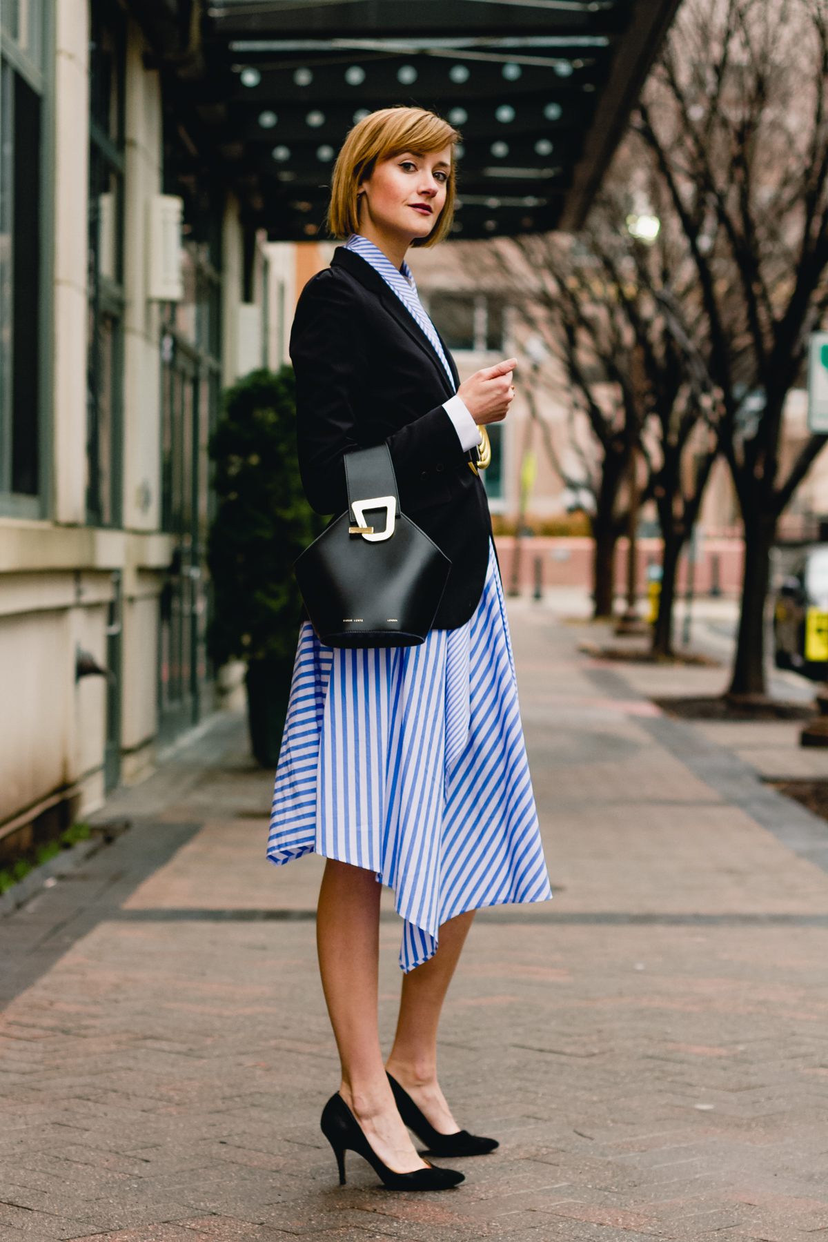 belted blazer and striped asymmetrical dress