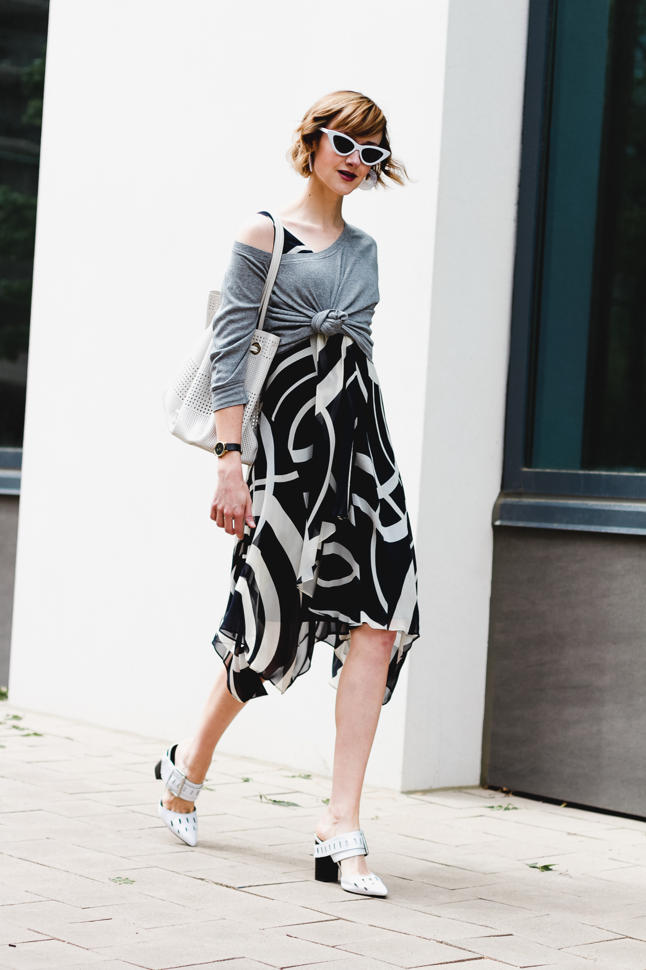 knotted sweatshirt over dress