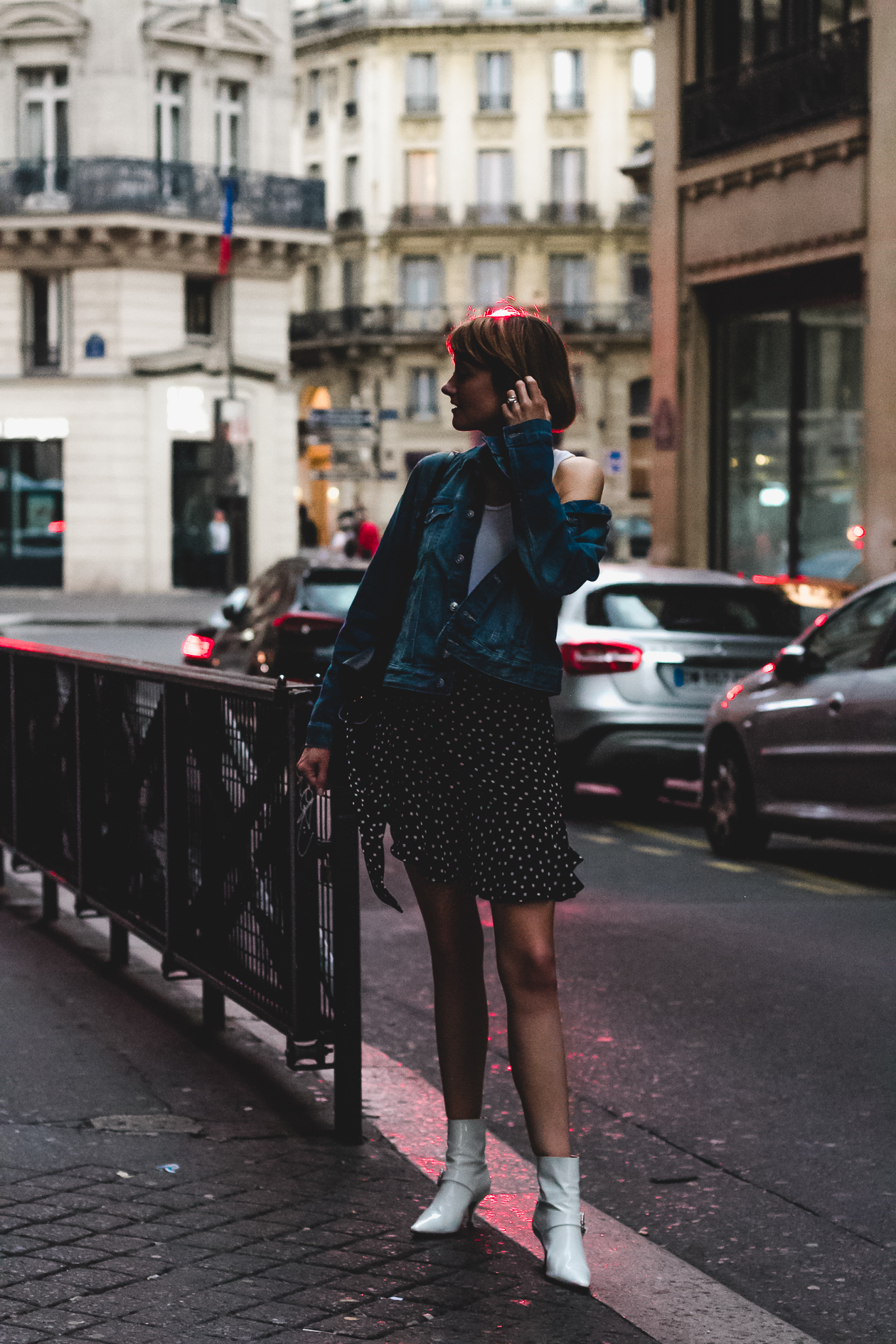 denim jacket, polka dot skirt, and white boots