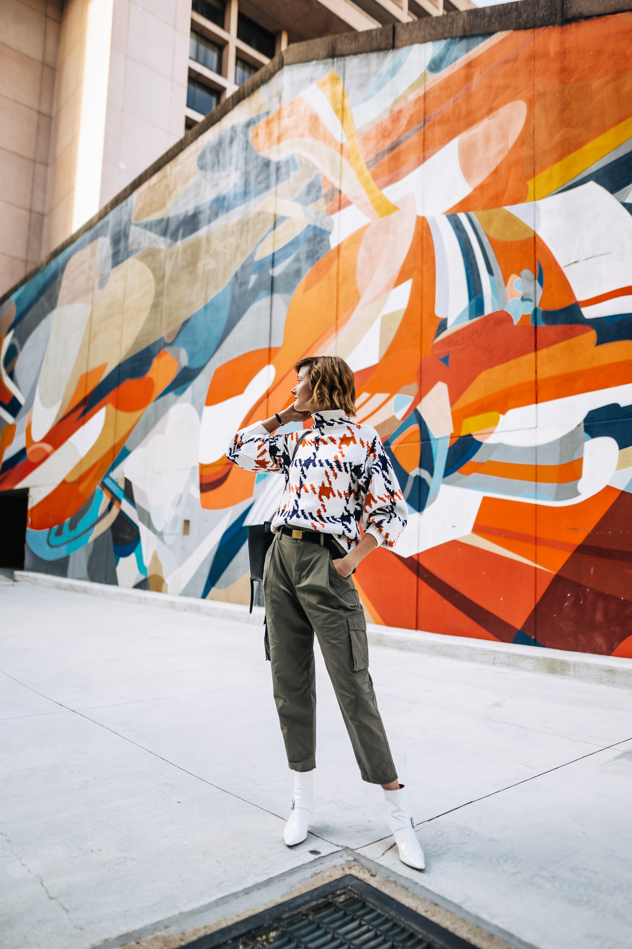 bright print sweater with cargo pants