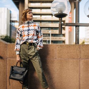 bright print sweater with cargo pants