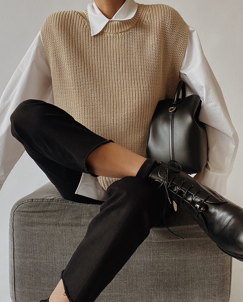 sweater vest & black pants