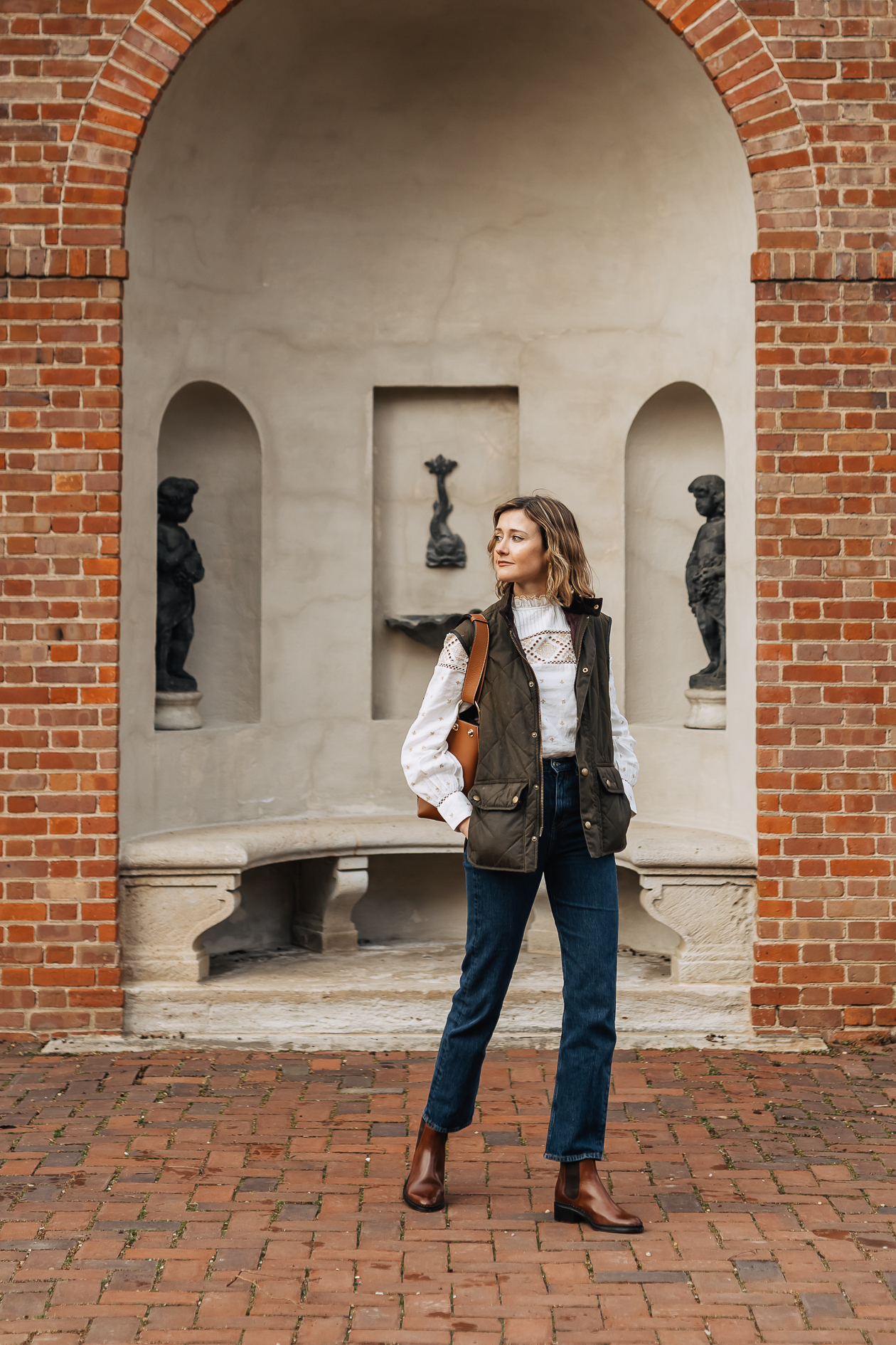 spring layering outfit with vest