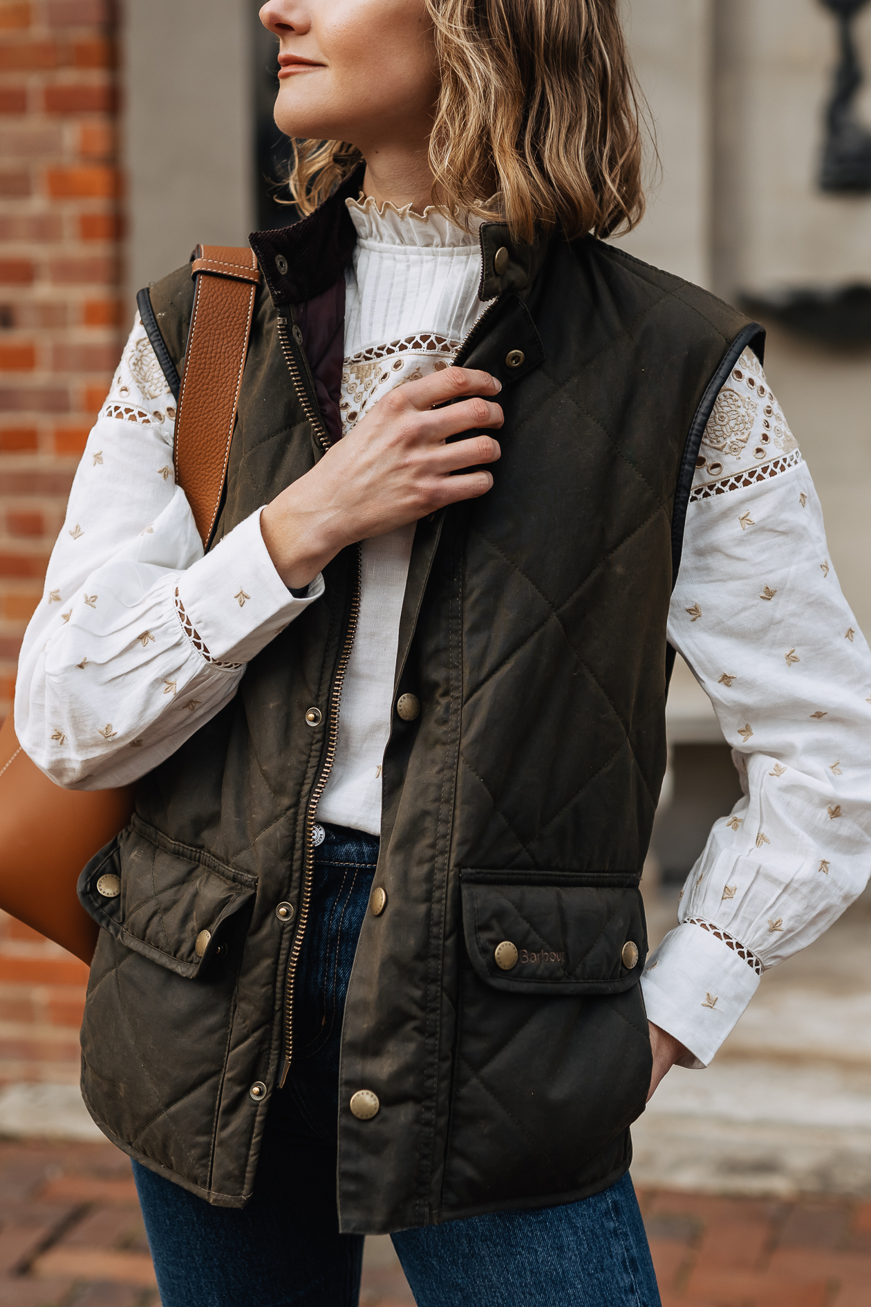 spring layering outfit with vest